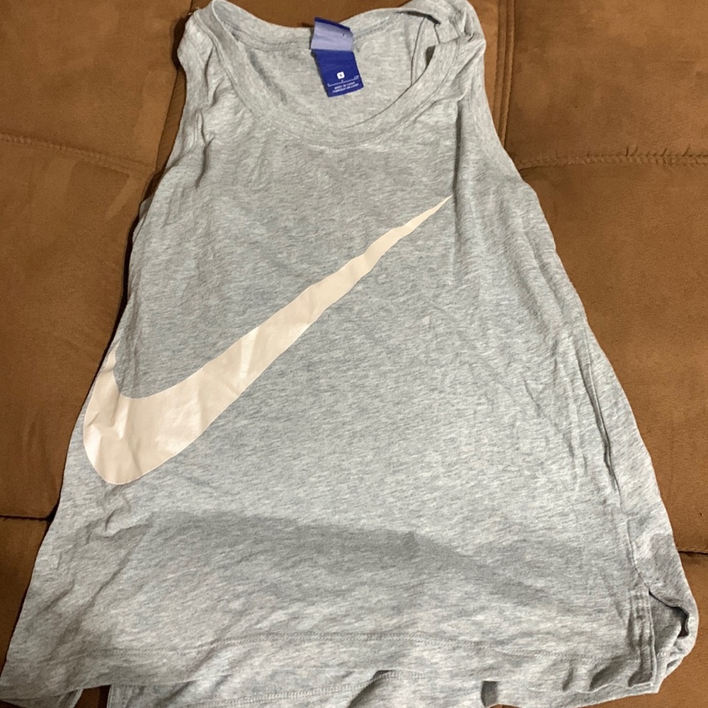 Grey and white Nike tank size S